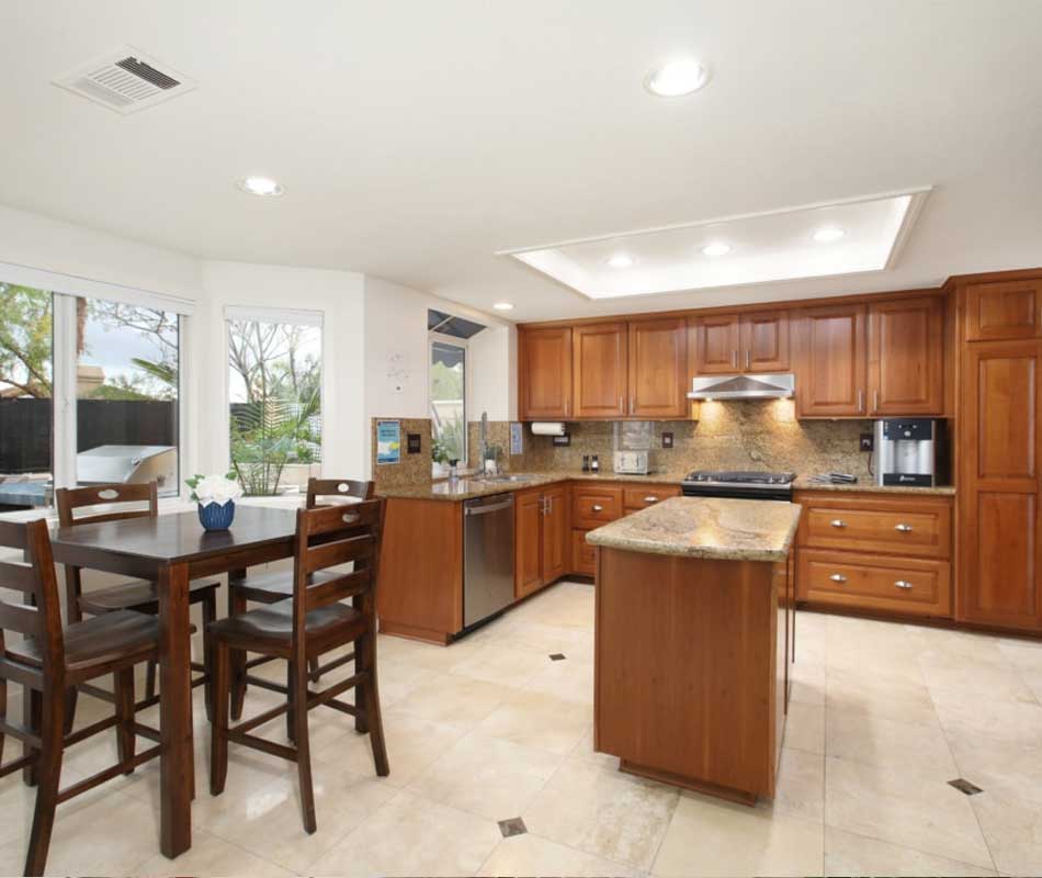 kitchen with island and dining table