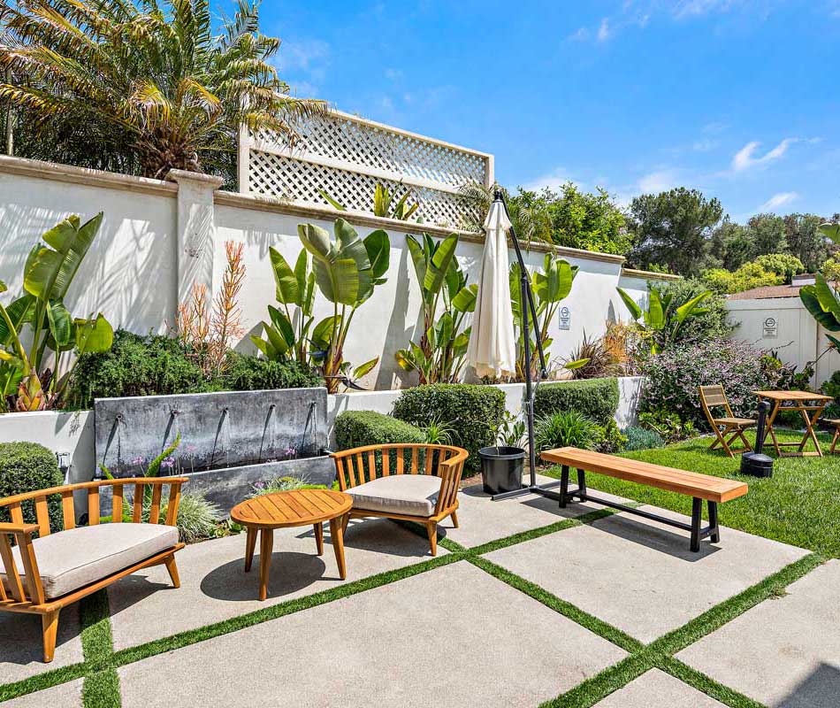 backyard with seating and grass