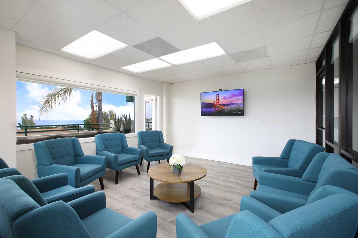 group therapy room with blue chairs at Alter's intensive outpatient program for mental health